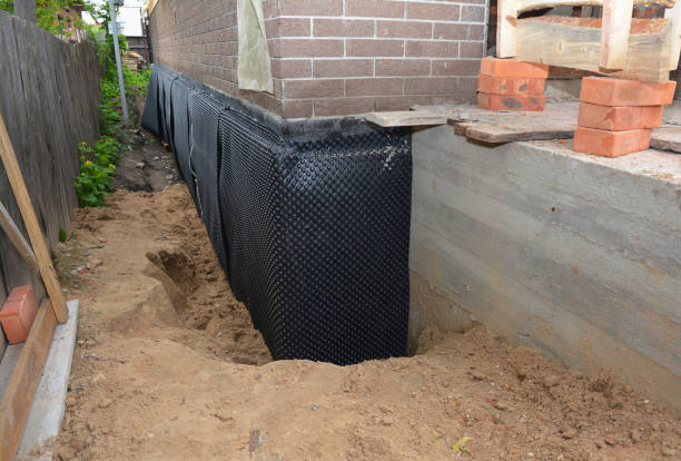 Happy homeowners after waterproofing job in Rugby